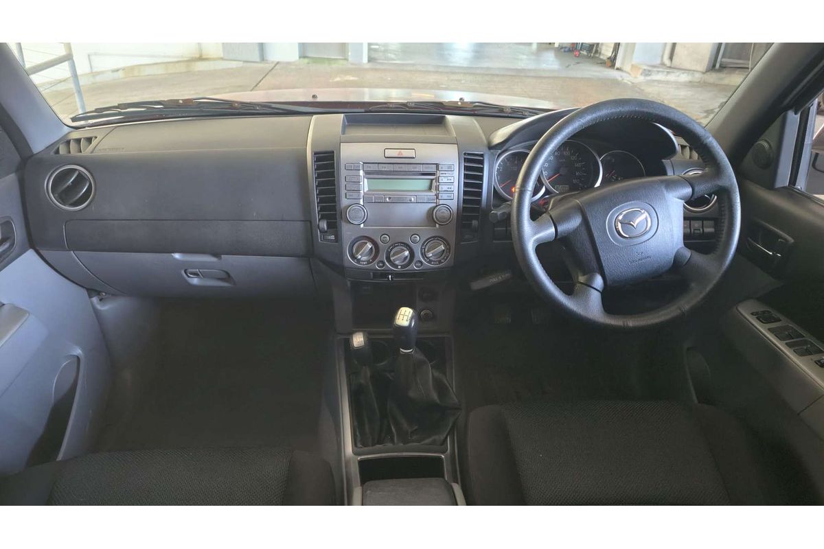 BT-50 09 UPGRADE BOSS B3000 SDX (4x4) 3.0L DT4 DIESEL TURBO F/INJ 5 SP MANUAL DUAL CAB P/UP 