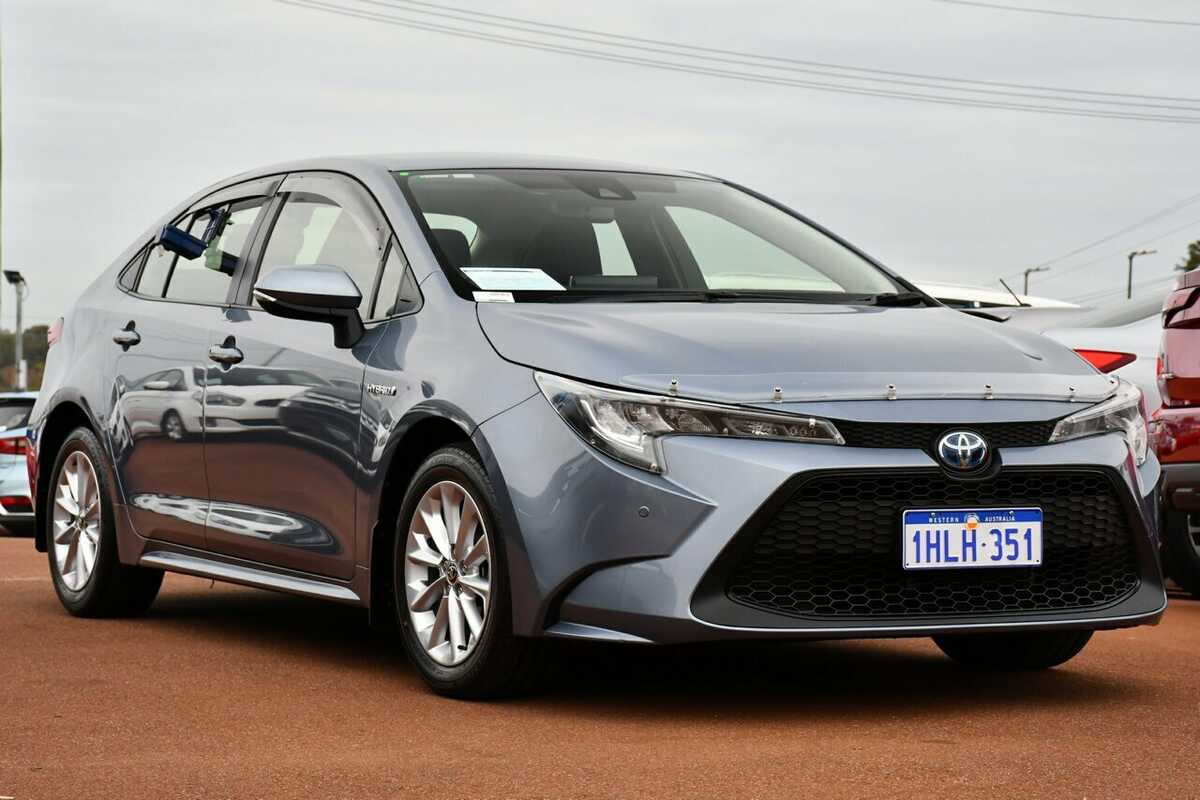 SOLD 2021 Toyota Corolla Ascent Sport E-CVT Hybrid in Blue | Used Sedan ...